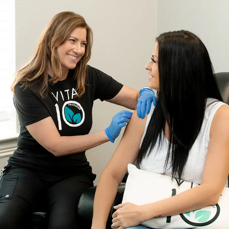 Vita 10 Therapy team member smiling at client